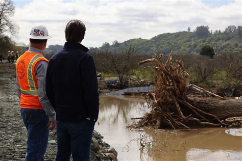 PHOTOS: Gov. Newsom tours storm damage in Pajaro after levee breach